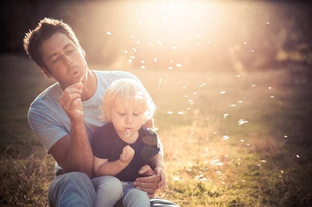 Father and Child Blowing Bubbles Father and Child Blowing Bubbles